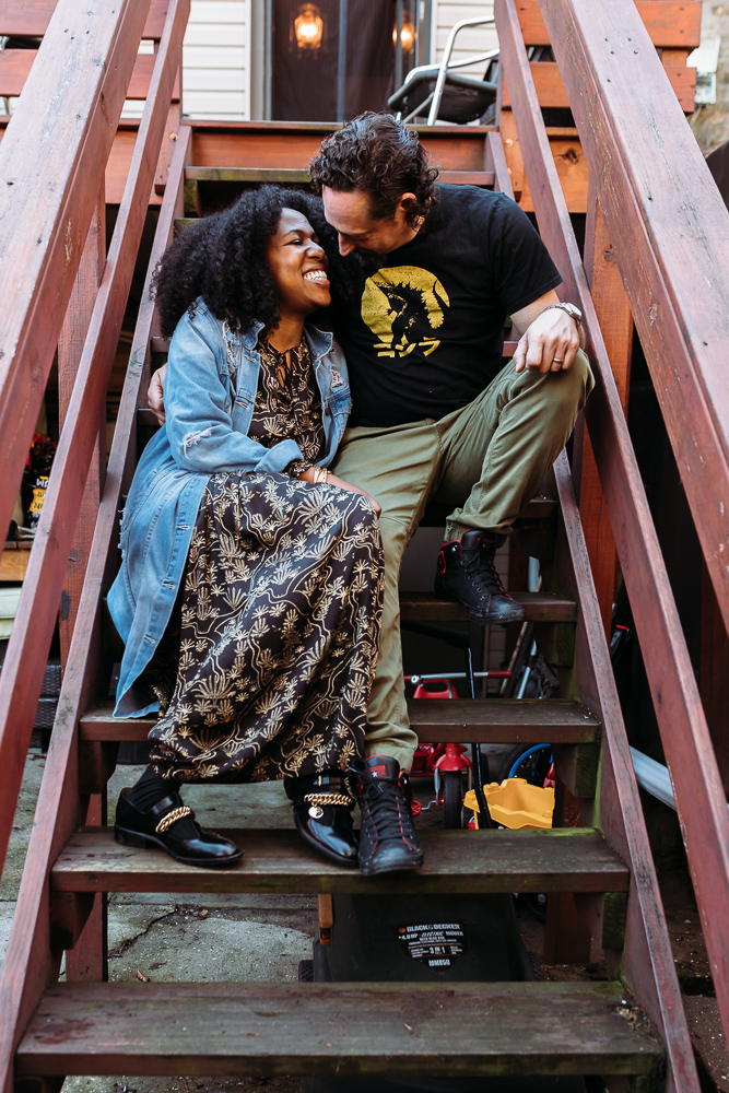 Mom and Dad sharing a special moment on the stairs in their Bed Stuy Brooklyn home for a family photo session. 