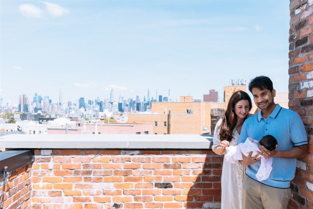 Family of three on rooftop balcony, In Home Photoshoot, NYC Westchester County Family and newborn Photography