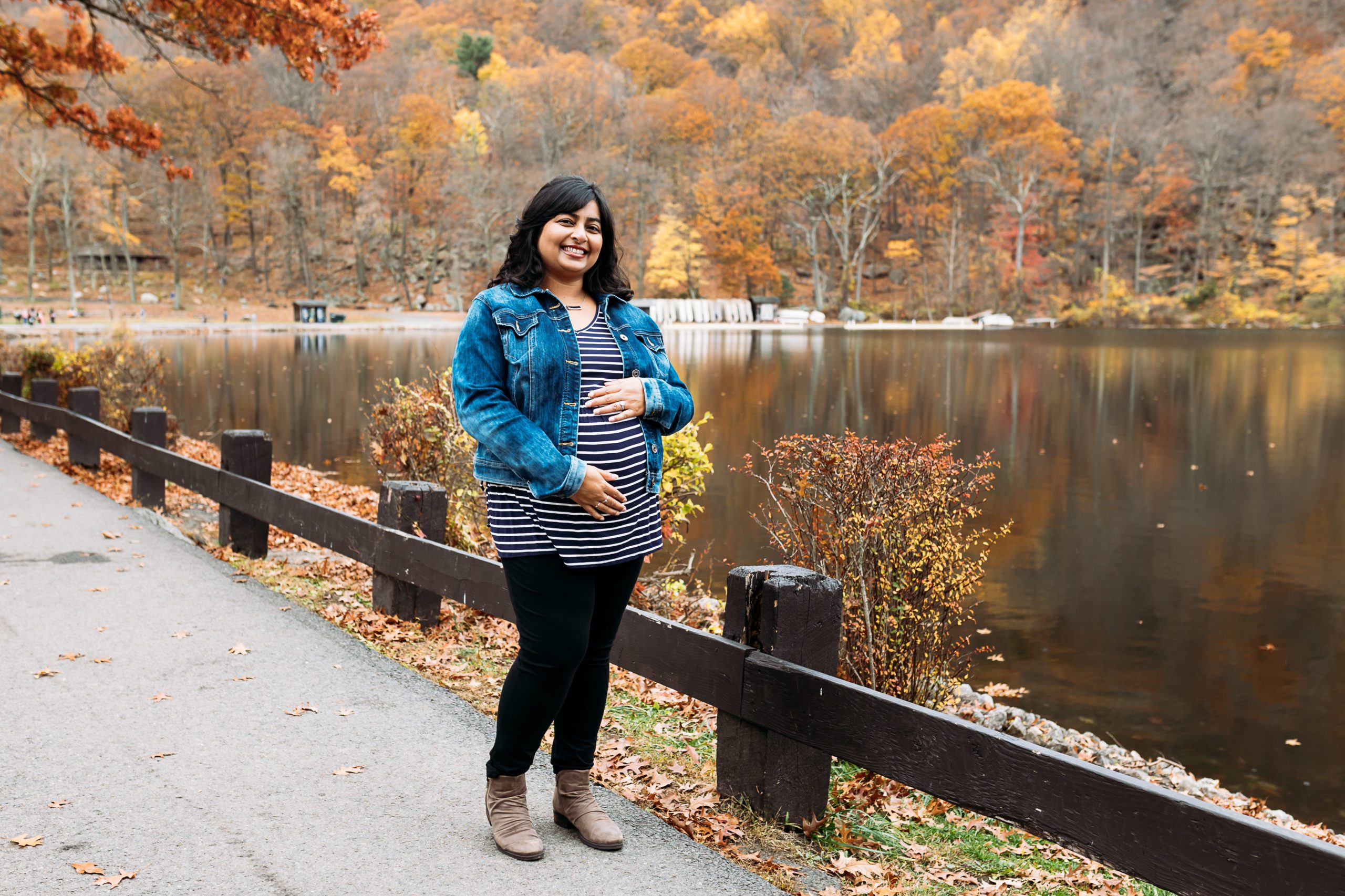 Autumn and Fall Maternity Photos on a pathway at a NYC City Park