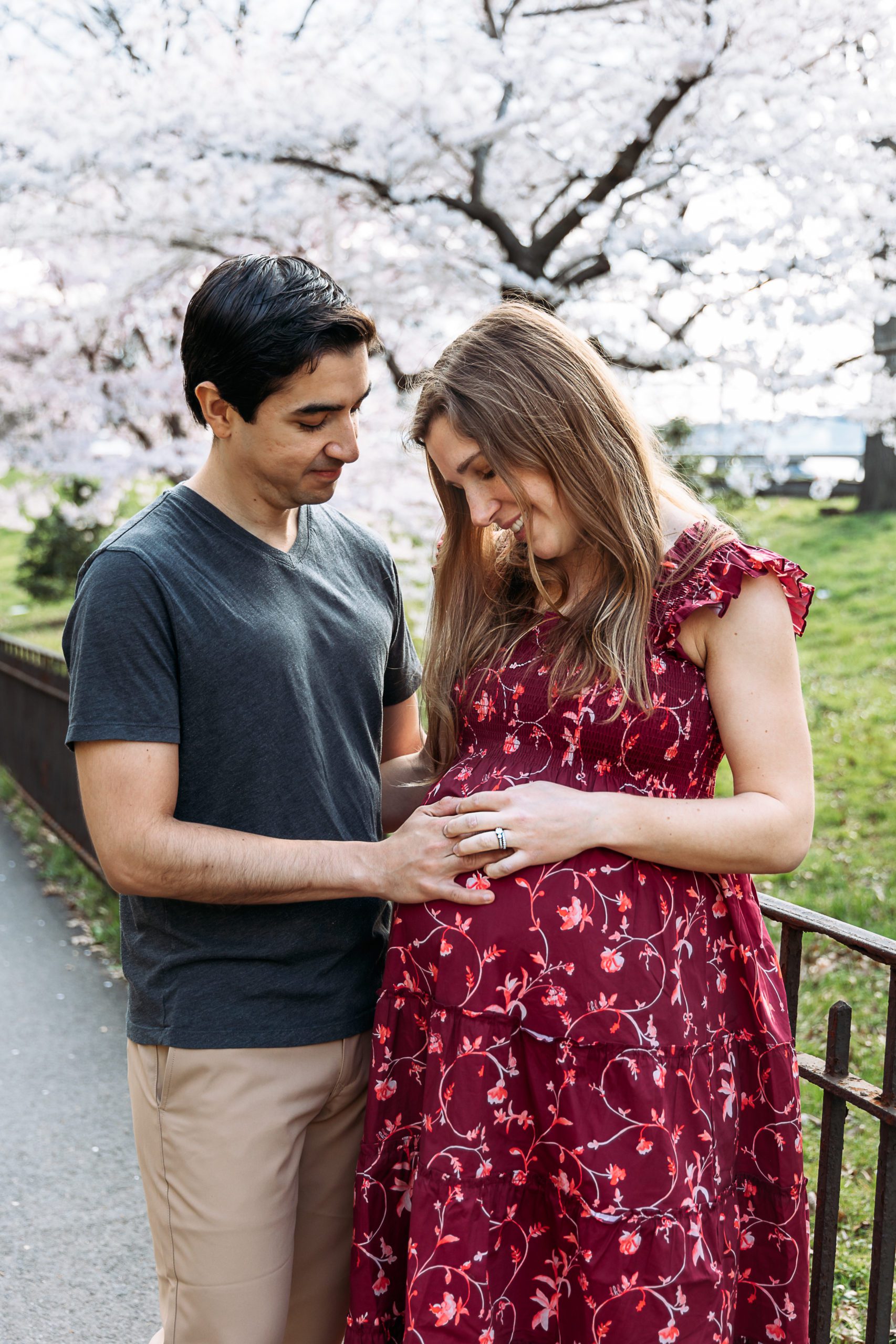 Outdoor Spring Maternity photoshoot poses and outfits in New York City Westchester County outside their New York apartment photographed by Amy Nghe Photography NYC Maternity Photographer